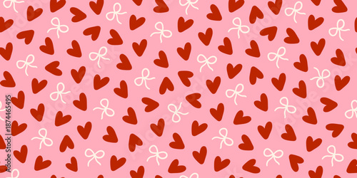 Minimalistic seamless pattern with small red hearts and white bows on a pink background. Vector print for wallpaper, fabric, textile design, wrapping paper.