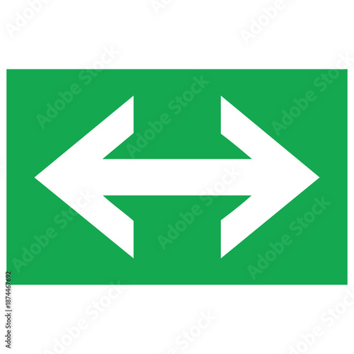 Green sign with white arrows pointing left and right on opposite directions