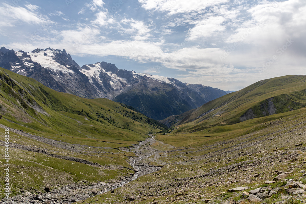 Fototapeta premium Mountain landscape in the Arves Massif, French Alps, with the iconic La Meije peak in the background.