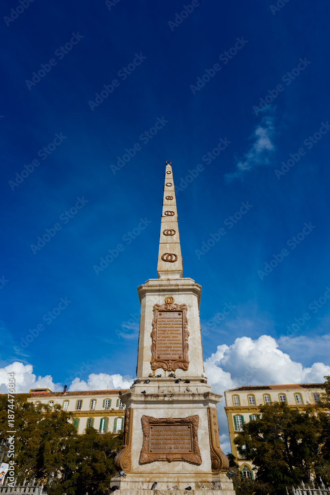 Obraz premium Historic Torrijos Monument in Plaza de la Merced, Malaga