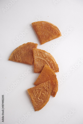 Minimal Composition of Kuih Kapit Cookies on White Background