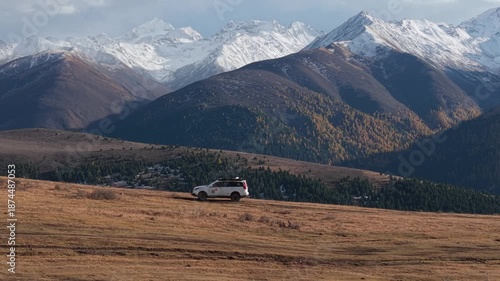 Overlanding SUV in Remote Alpine Mountain Landscape