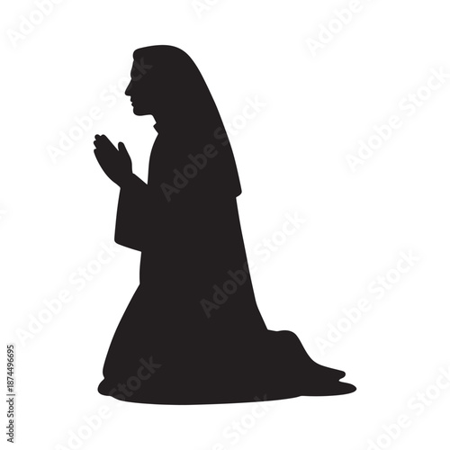 Silhouette of a praying nun in a kneeling position religious devotion shown