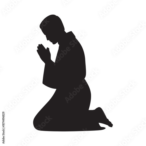 A silhouette of a person kneeling in prayer head bowed in reverence