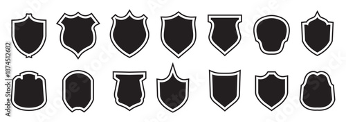 Collection of diverse black shield icons in various shapes and styles for security and protection concepts