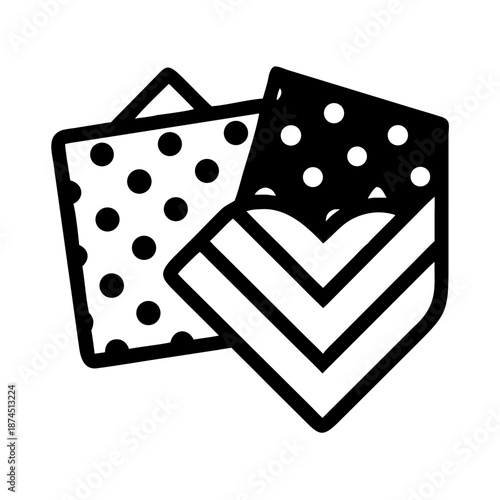 Pocket squares in polka dots and stripes, folded stylishly