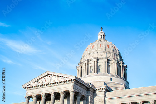 Close-up of the Missouri State Capitol building in Jefferson City under a clear blue sky.