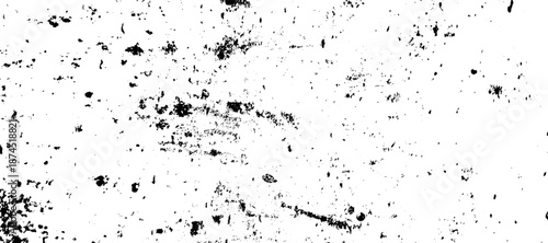 A bold black and white grunge texture with prominent scattered dark marks and rugged imperfections. vector