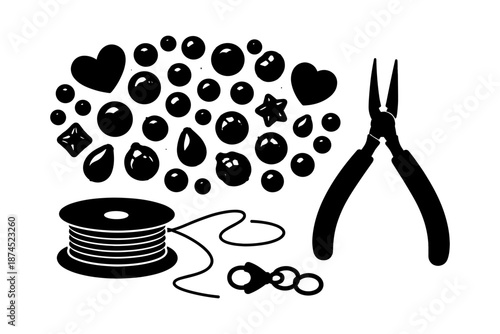 Silhouette jewelry making tools with beads and charms on white background