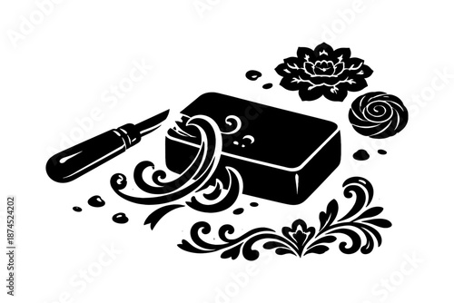 Elegant soap carving design with floral motifs and decorative elements in black silhouette style