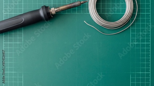 Overhead View of Soldering Tools on Green Cutting Mat