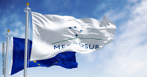 Flags of Mercosur and European Union waving in the wind on a clear day © rarrarorro