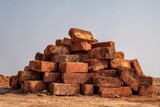 Massive heap of bricks on neutral ground, rugged texture, and subdued color palette