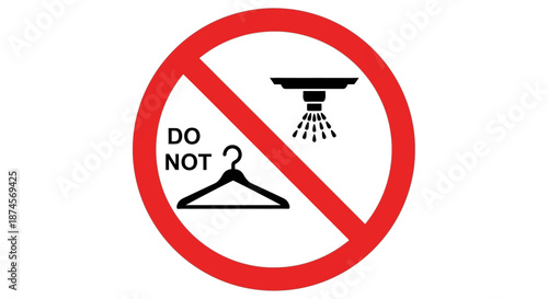 Essential Fire Safety Warning Sign Prohibiting Hanging Items on Automatic Sprinkler Systems to Ensure Unobstructed Emergency Water Discharge and Building Protection