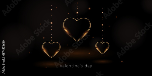 Elegant Valentines Day vector banner with glowing golden hanging hearts on dark background. Romantic design with light particles and soft shimmer, perfect for love greetings and luxury promotions.