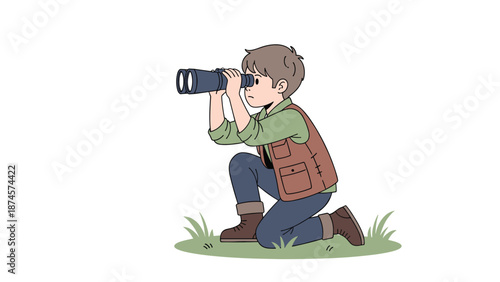 Curious young boy in a vest and boots kneels on the grass to look through his binoculars, exploring nature and wildlife in the outdoors.