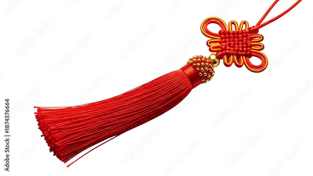 Obraz premium A decorative red tassel with intricate knotwork hanging from a gold bead on transparent background