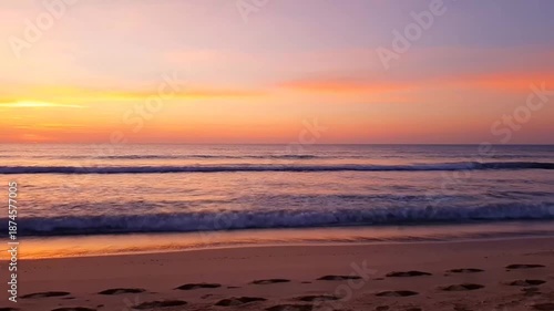 Wallpaper Mural Beautiful Beach Sunset with Ocean Waves and Footprints. Torontodigital.ca