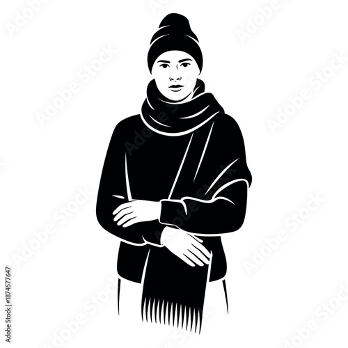 Woman in winter clothing wearing scarf and beanie standing in snow with arms crossed and looking at camera during cold weather outdoor