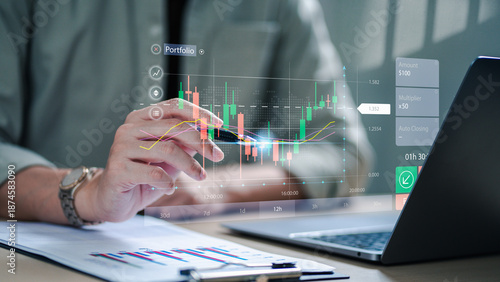 Investor analyzing real-time trading chart with digital portfolio dashboard on laptop, focusing on stock market trends, financial data, and investment strategies. investment, trading, stock, portfolio