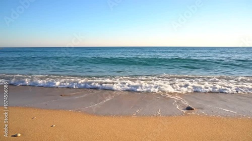 Wallpaper Mural Ocean Waves Crashing on Sandy Beach Under Clear Sky Torontodigital.ca
