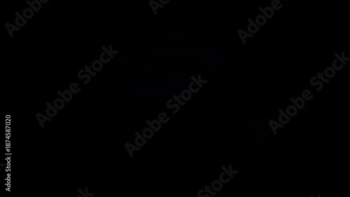 Television switch turn on off screen displays grainy static and activation message with watermark. Suitable for tech and entertainment concepts in designs and projects