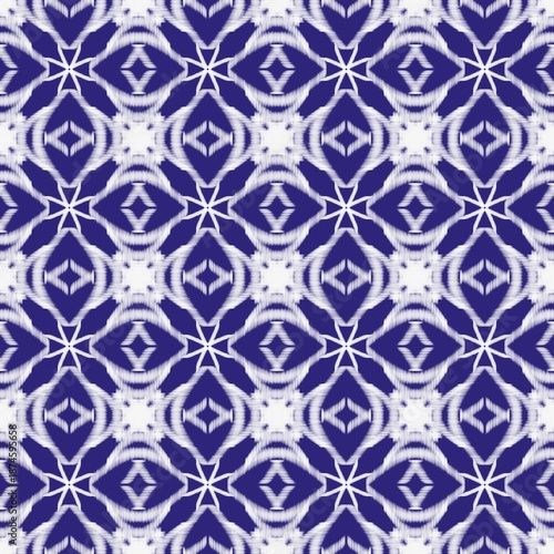 Blue and white ikat seamless pattern traditional tribal ethnic indigo textile design background for fabric print wallpaper and wrapping paper.