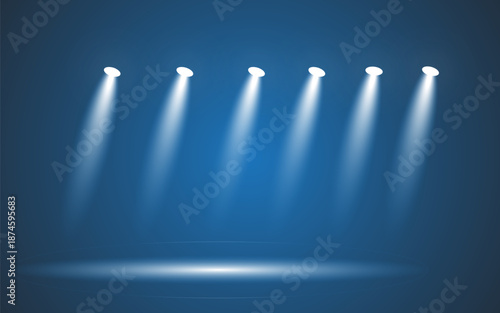 Six stage spotlights shining down on a dark blue background
