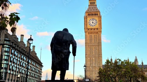 Churchill status ear Westminster, sunset. London