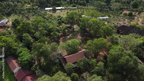 Drone Aerial View of Rural Tropical Village and Green Farmland Area