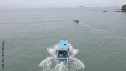Drone Aerial Boats Crossing Calm Tropical Sea Near Green Island Coasts