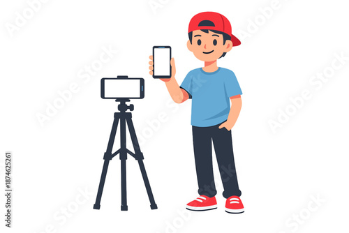 Boy holding smartphone in front of tripod and camera