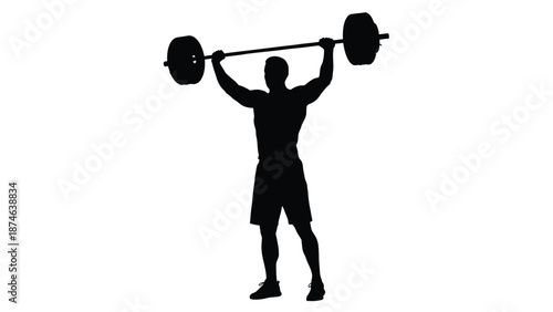 Silhouette of a muscular athlete successfully completing an overhead barbell press exercise in a gym