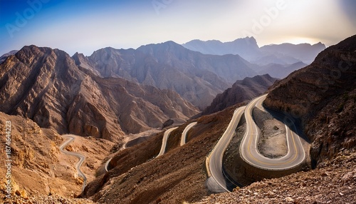 scenic view of hajar mountains in ras al khaimah rugged landscapes winding mountain road mountain winding road