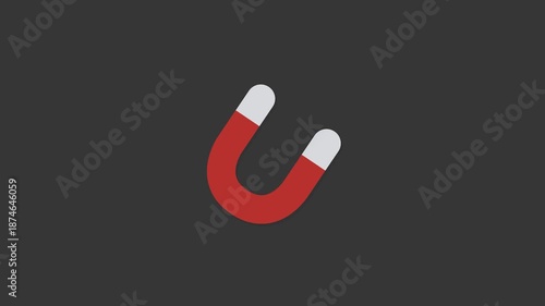 Magnetic Field Concept: A vibrant red and white horseshoe magnet stands prominently against a sleek, gray backdrop, symbolizing the power of attraction.