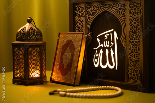 Ramadan still life with lantern, Quran and Islamic calligraphy. Spiritual worship background.