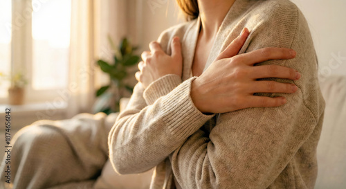 Wallpaper Mural Woman's hands gently crossing over her own chest or arms, self-love concept Torontodigital.ca