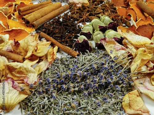 Dried herbs, flowers, spice, orange peels, top view, background. Ingredients for air freshening and relaxation.
 