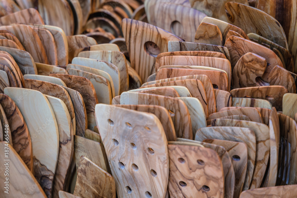 Obraz premium Olive wood kitchen utensils for sale on Old Town of Corfu city on island of Corfu, Ionian Islands, Greece