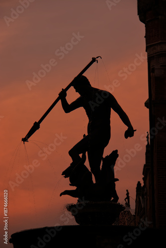 Neptune Fountain in the center of Gdansk at sunset