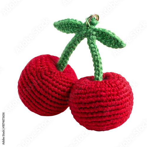 Charming crochet cherries with green stems and leaves, perfect for crafts and playful decor.