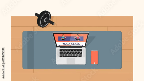 Virtual yoga session at home with laptop and smartphone on yoga mat