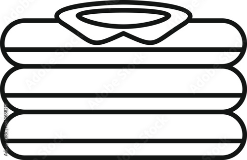 Stack of freshly laundered clothing items, representing organization and cleanliness as a minimalist symbol