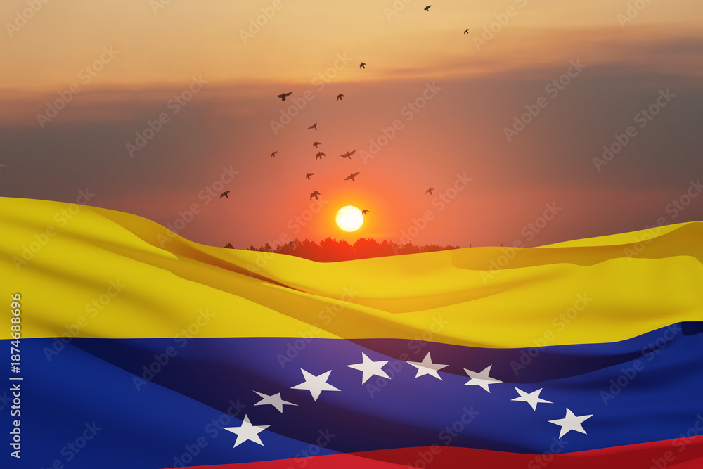 Obraz premium Venezuela flag on background of sunset sky with flying birds. Patriotic concept. Banner with place for text.
