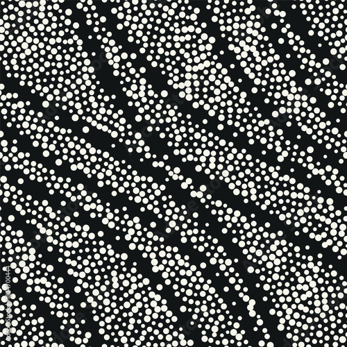 Vector seamless pattern. Modern spotted texture. Repeating abstract dotted background. Graphic wavy stripes. Can be used as a swatch in Illustrator.