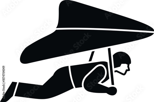 Pilot operating a hang glider, soaring through the sky with freedom