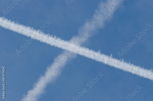 Minimalist Sky Scene With Airplane Contrails
