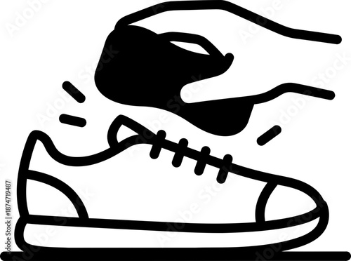 Hand cleaning a shoe with a brush. Manual footwear care process. Outline style vector icon. Cleaning, hygiene and maintenance concept