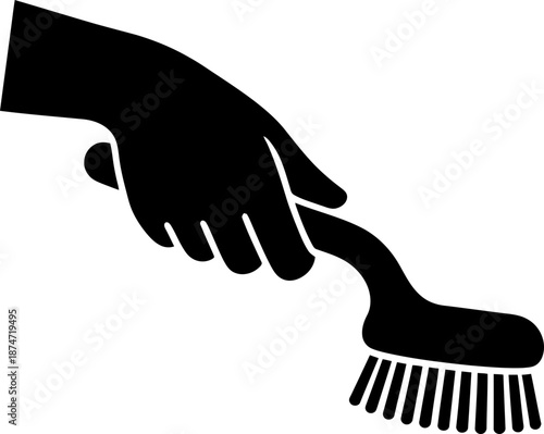 Hand holding a cleaning brush in a simple silhouette style. Cleaning service and hygiene concept. Vector icon for website, app, logo, symbol
