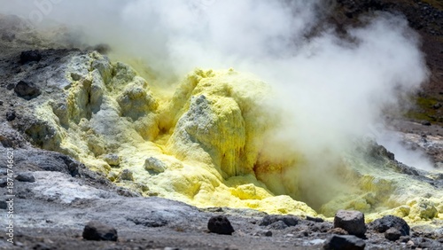 Steaming sulfur deposits in a volcanic crater